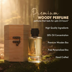 Premium woody perfume bottle labeled Blood Wood beside a wooden box in forest light.