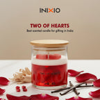 Two of Hearts scented soy wax candle in glass jar with rose petals and vanilla beans